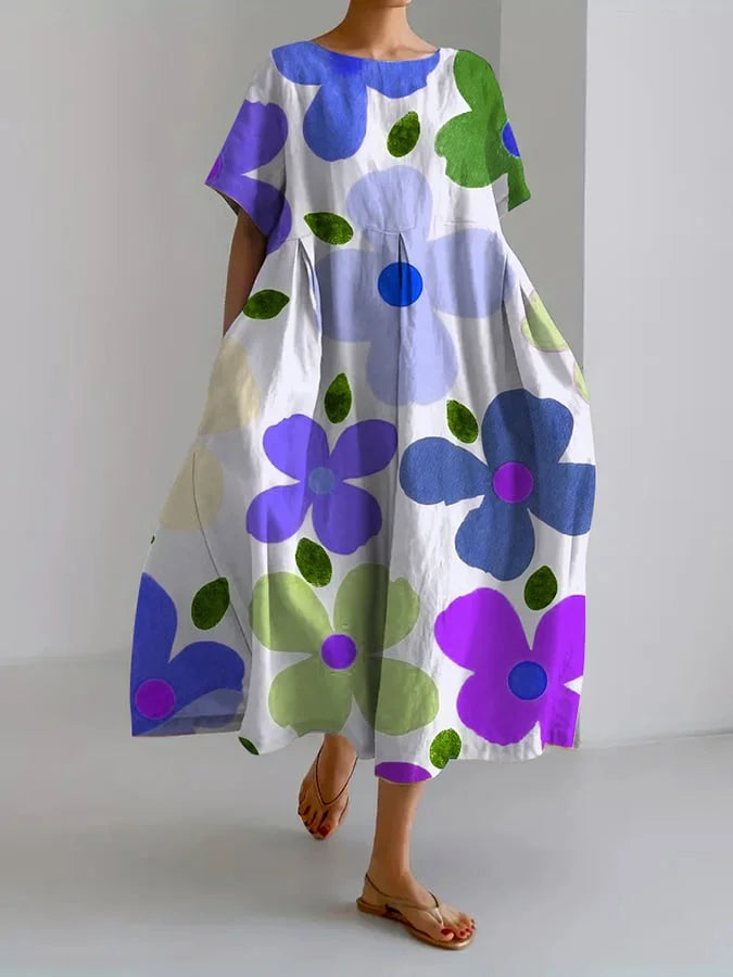 Eliana | Midi Kjole med Blomster i Løs Stil og Sommerkomfort til Farverige Dage